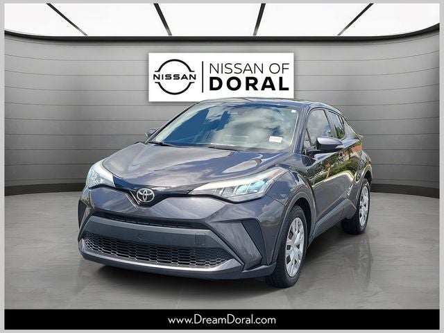 2021 Toyota C-HR LE in Magnetic Gray Metallic — front three-quarter view